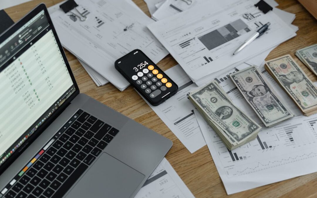 money management tools scattered on a desk